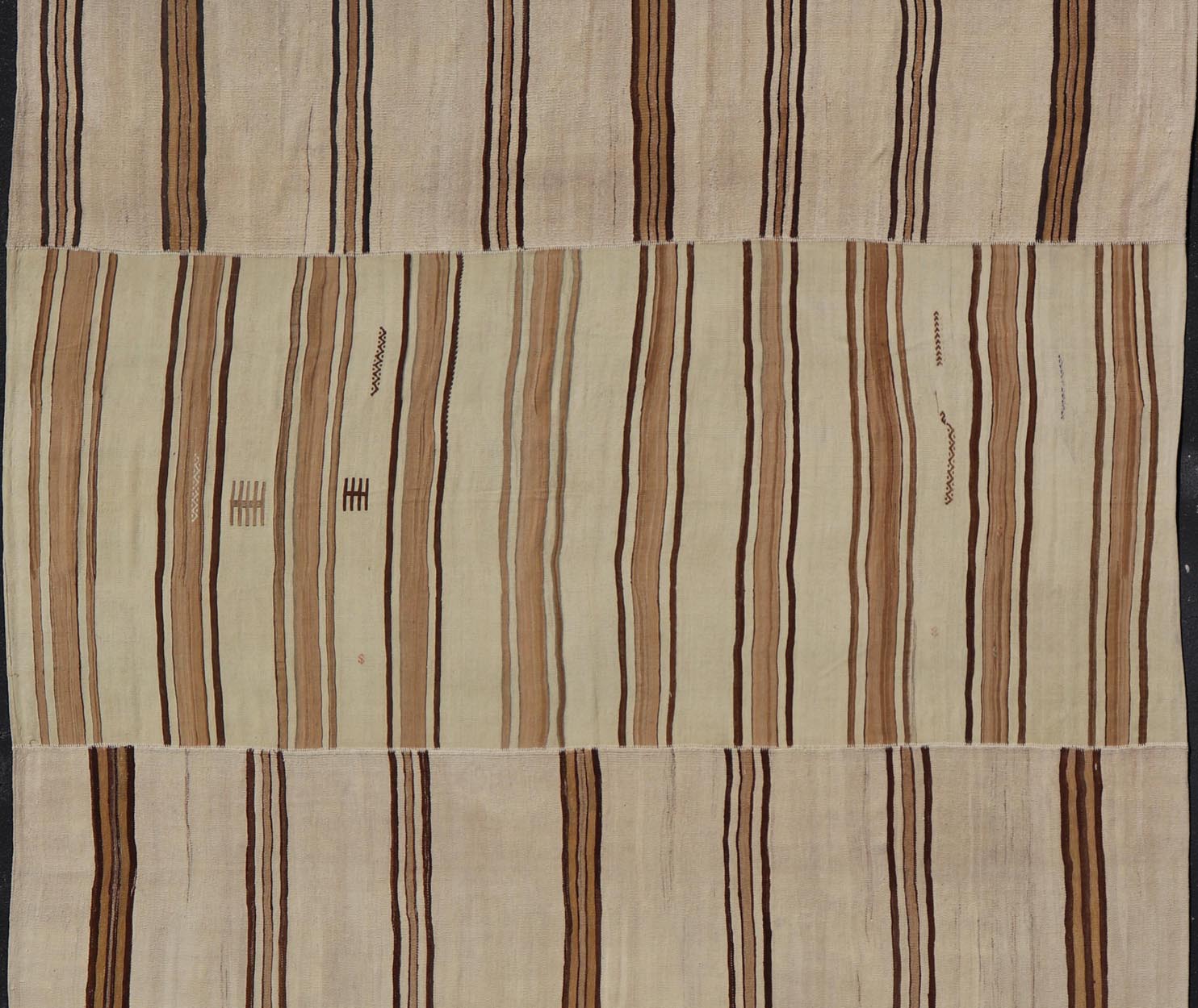Large Vintage Flat - Woven Turkish Paneled Kilim Rug in Wool with Stripe Design This flat - weave tribal Turkish kilim has been hand - woven in wool. The rug features an sub - geometric striped design, and is rendered earthy tones; making this rug a su... - Keivan Woven ArtsEN - 13113 - 178719 - 178838 - 19748