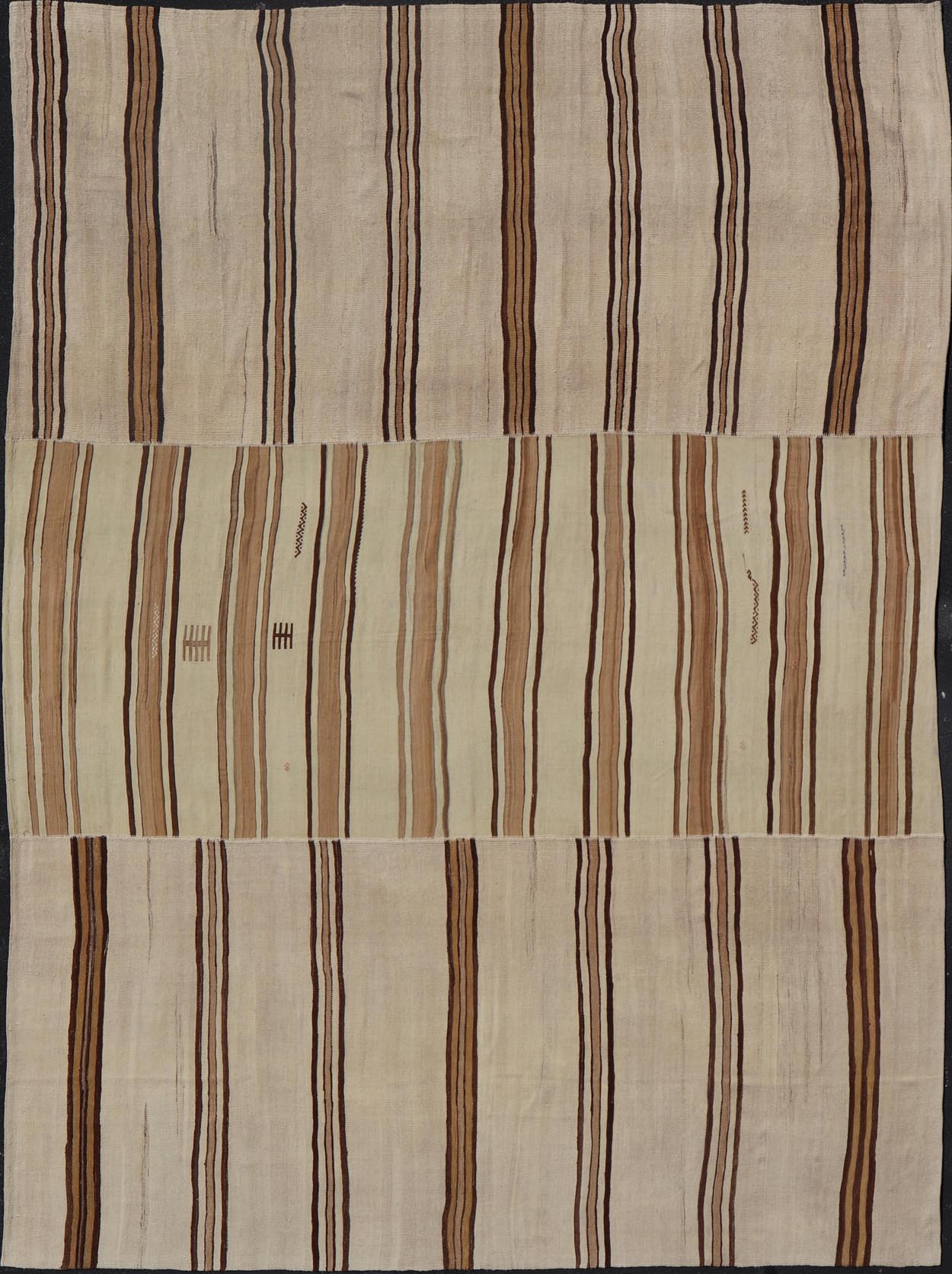Large Vintage Flat - Woven Turkish Paneled Kilim Rug in Wool with Stripe Design This flat - weave tribal Turkish kilim has been hand - woven in wool. The rug features an sub - geometric striped design, and is rendered earthy tones; making this rug a su... - Keivan Woven ArtsEN - 13113 - 178719 - 178838 - 19748