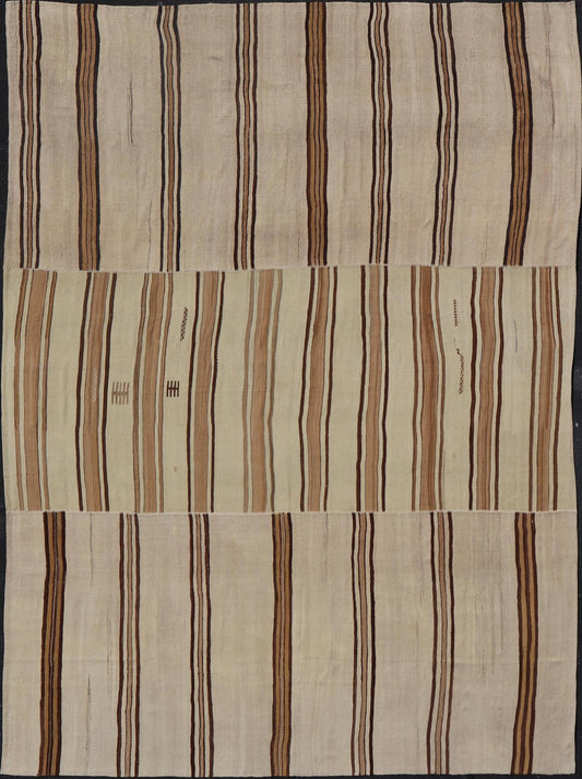 Large Vintage Flat - Woven Turkish Paneled Kilim Rug in Wool with Stripe Design This flat - weave tribal Turkish kilim has been hand - woven in wool. The rug features an sub - geometric striped design, and is rendered earthy tones; making this rug a su... - Keivan Woven ArtsEN - 13113 - 178719 - 178838 - 19748