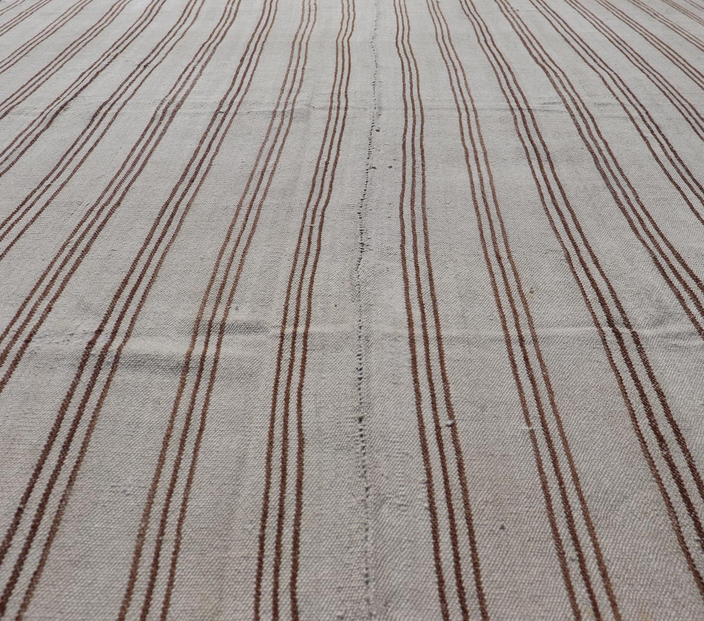Measures: 7'2 x 9'3 Vintage Turkish Kilim Flat - Weave in Neutral Tones of Cream & Brown Stripes. Keivan Woven Arts /rug#EN - 13183, country of origin / type: Turkey / Kilim 1950s Vintage Hand Woven neutral Kilim flat - weave. This vintage Kilim h... - Keivan Woven ArtsEN - 13183 - 21215Rug