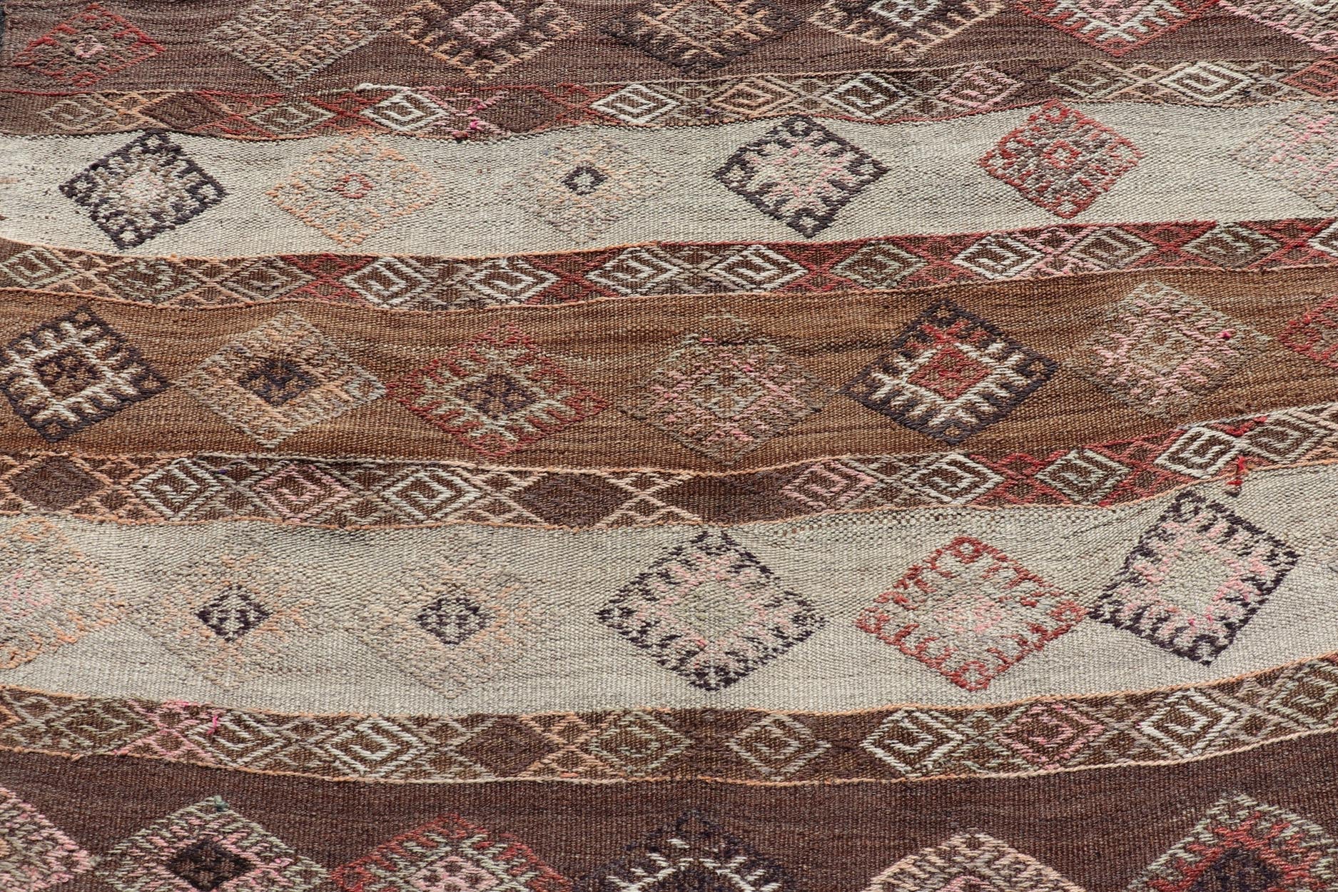 Measures: 5'8 x 11'5 Vintage Turkish Embroidered Flatweave Rug Gallery with Striped Geometric Design. Keivan Woven Arts / rug EN - 13194, country of origin / type: Turkey / Kilim, circa 1950. - Keivan Woven ArtsEN - 13194 - 21721Rug