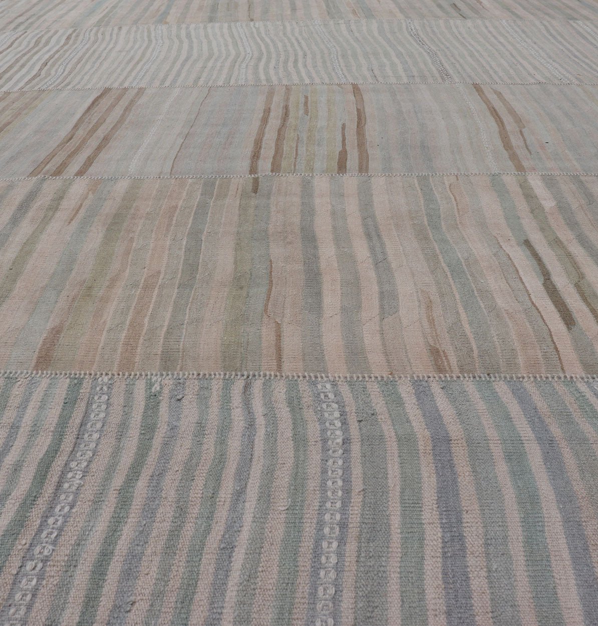 Measures: 9'9 x 16'6 Large Paneled Vintage Turkish Striped Kilim Rug in Soft Muted Colors. Keivan Woven Arts / Rug/EN - 13209, country of origin / type: Turkey / Kilim, circa 1950 Woven during the early - 20th century in Turkey, this Kilim is de... - Keivan Woven ArtsEN - 13209 - 22692Rug