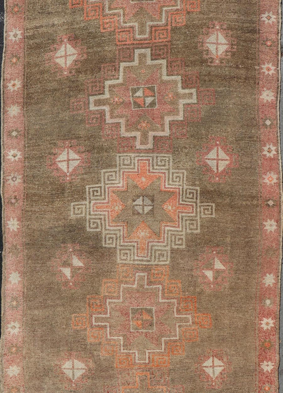 Turkish Kars Gallery Runner with Large Medallions in Red, Brown, Taupe, Tan Vintage Hand Knotted Kars Gallery runner from Turkey with Medallion design in various tones of red, orange taupe. and brown. Keivan Woven Arts / rug EN - 13243, country of... - Keivan Woven ArtsEN - 13243 - 18704