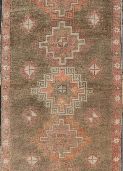 Turkish Kars Gallery Runner with Large Medallions in Red, Brown, Taupe, Tan Vintage Hand Knotted Kars Gallery runner from Turkey with Medallion design in various tones of red, orange taupe. and brown. Keivan Woven Arts / rug EN - 13243, country of... - Keivan Woven ArtsEN - 13243 - 18704Rug