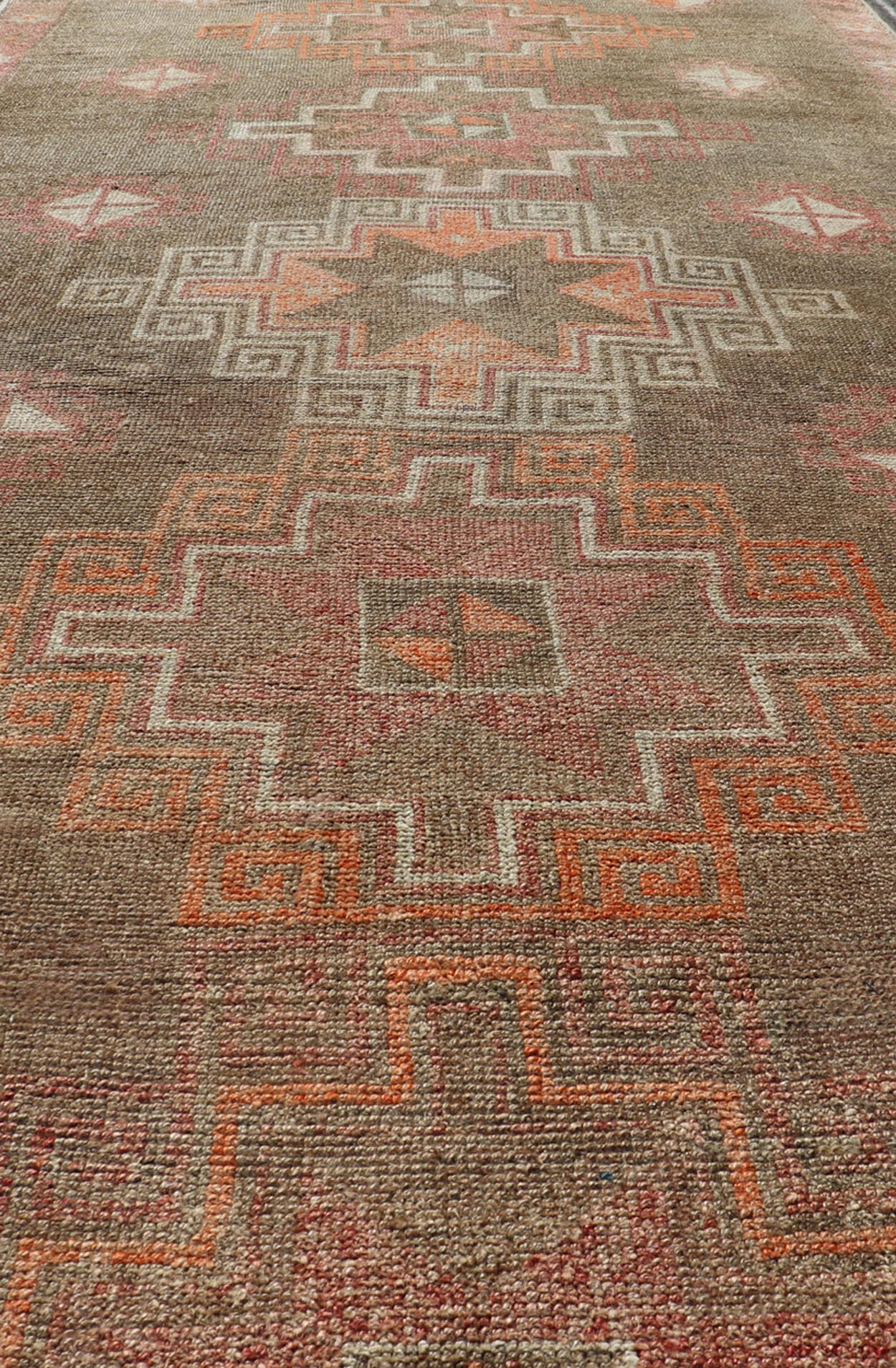 Turkish Kars Gallery Runner with Large Medallions in Red, Brown, Taupe, Tan Vintage Hand Knotted Kars Gallery runner from Turkey with Medallion design in various tones of red, orange taupe. and brown. Keivan Woven Arts / rug EN - 13243, country of... - Keivan Woven ArtsEN - 13243 - 18704