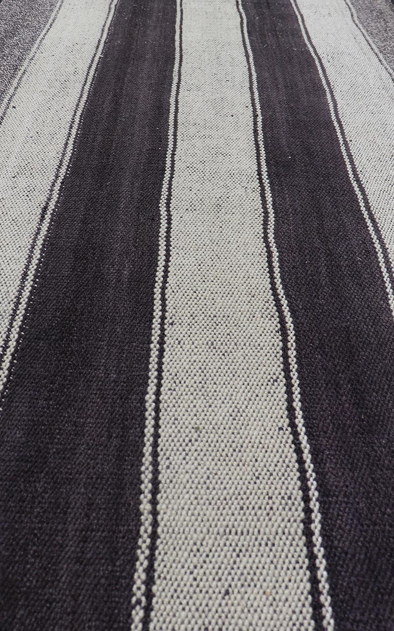 Vintage Turkish Kilim with Vertical Stripes in Brown and Cream Measures 2'7 x 6'2 This vintage flat weave Kilim has a very modern stripe design. Rendered in ebony, cream. With neutral colors and simple design, this flat weave is perfect ... - Keivan Woven ArtsEN - 13425 - 18655Rug