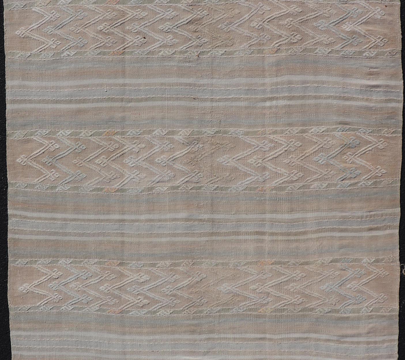 Striped Hand Woven Turkish Flat - Weave Kilim in Muted Colors and Tribal Motifs Turkish Kilim vintage carpet in muted colors and design with tribal motifs. Keivan Woven Arts / rug EN - 179780, country of origin / type: Turkey / Kilim , circa 1950... - Keivan Woven ArtsEN - 13478 - 18812Rug