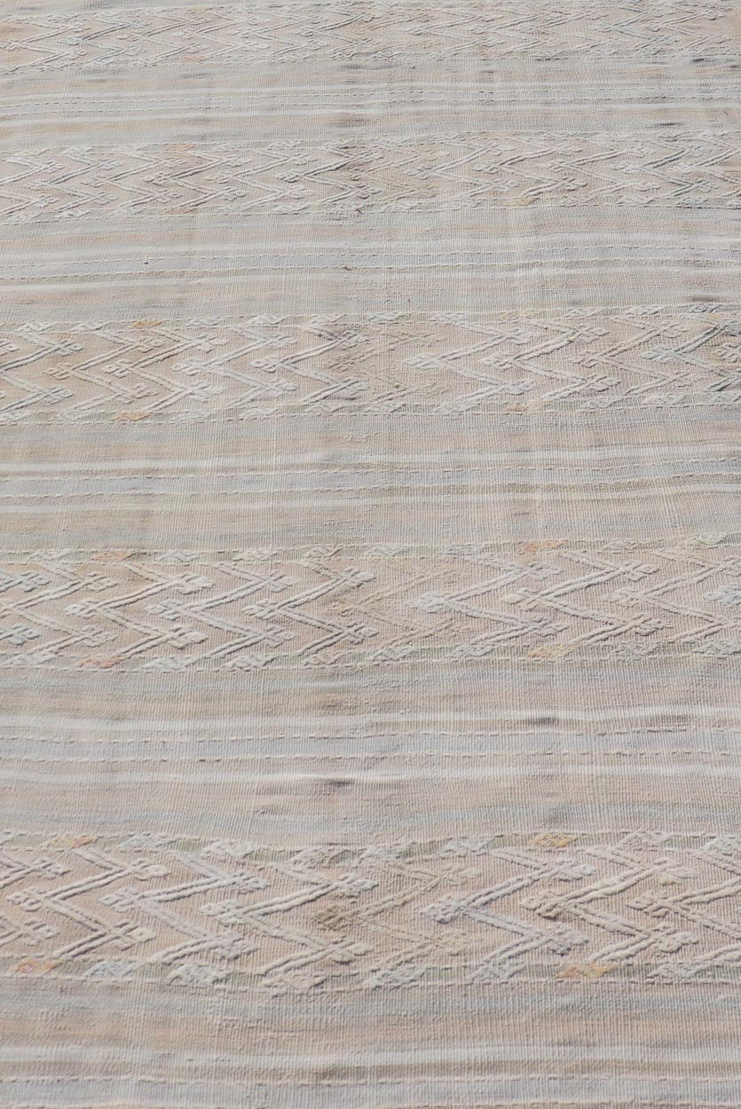Striped Hand Woven Turkish Flat - Weave Kilim in Muted Colors and Tribal Motifs Turkish Kilim vintage carpet in muted colors and design with tribal motifs. Keivan Woven Arts / rug EN - 179780, country of origin / type: Turkey / Kilim , circa 1950... - Keivan Woven ArtsEN - 13478 - 18812Rug