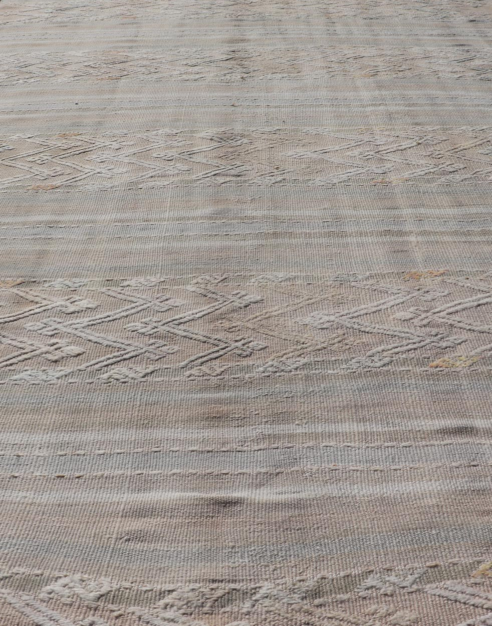 Striped Hand Woven Turkish Flat - Weave Kilim in Muted Colors and Tribal Motifs Turkish Kilim vintage carpet in muted colors and design with tribal motifs. Keivan Woven Arts / rug EN - 179780, country of origin / type: Turkey / Kilim , circa 1950... - Keivan Woven ArtsEN - 13478 - 18812Rug