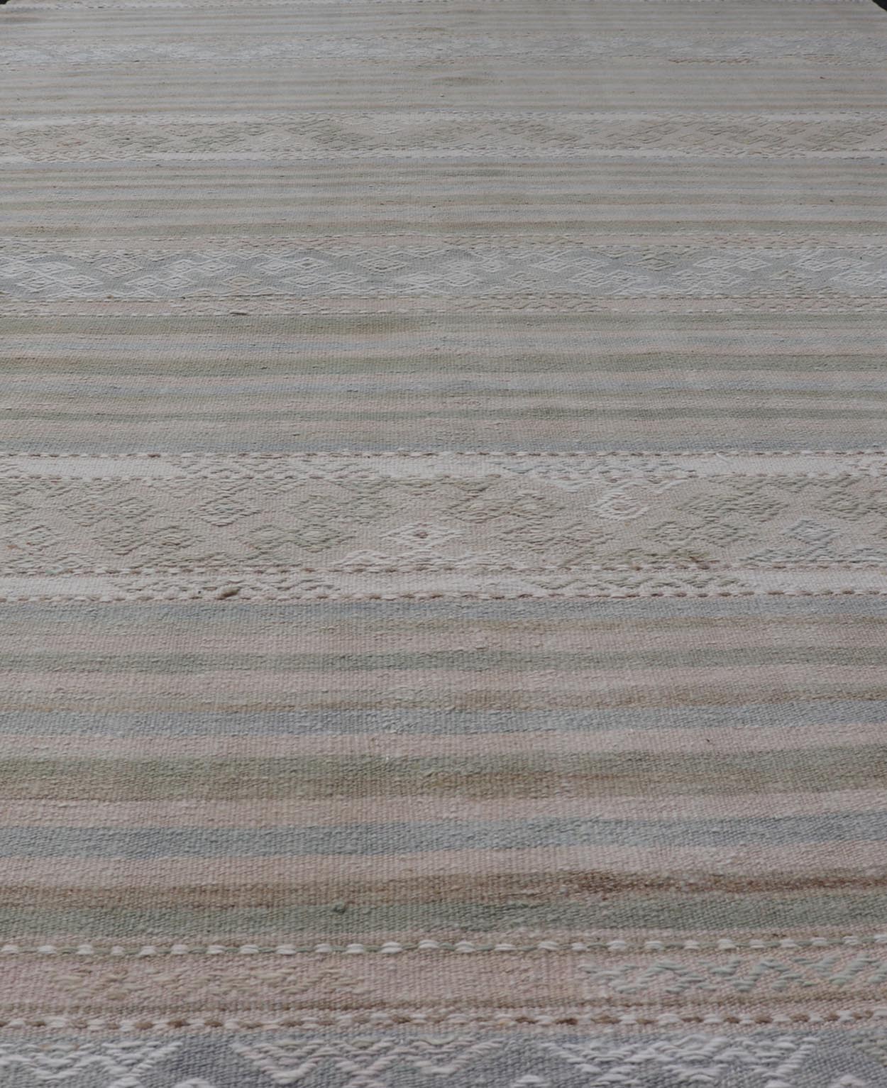 Turkish Gallery Flat - Weave Kilim in Muted Colors with Stripes and Embroideries Measures: 5'2 x 10'1 This charming vintage flat weave Kilim was hand woven in Turkey during the 1950s. Varying color combinations of muted shades of blue,... - Keivan Woven ArtsEN - 13481 - 19250Rug