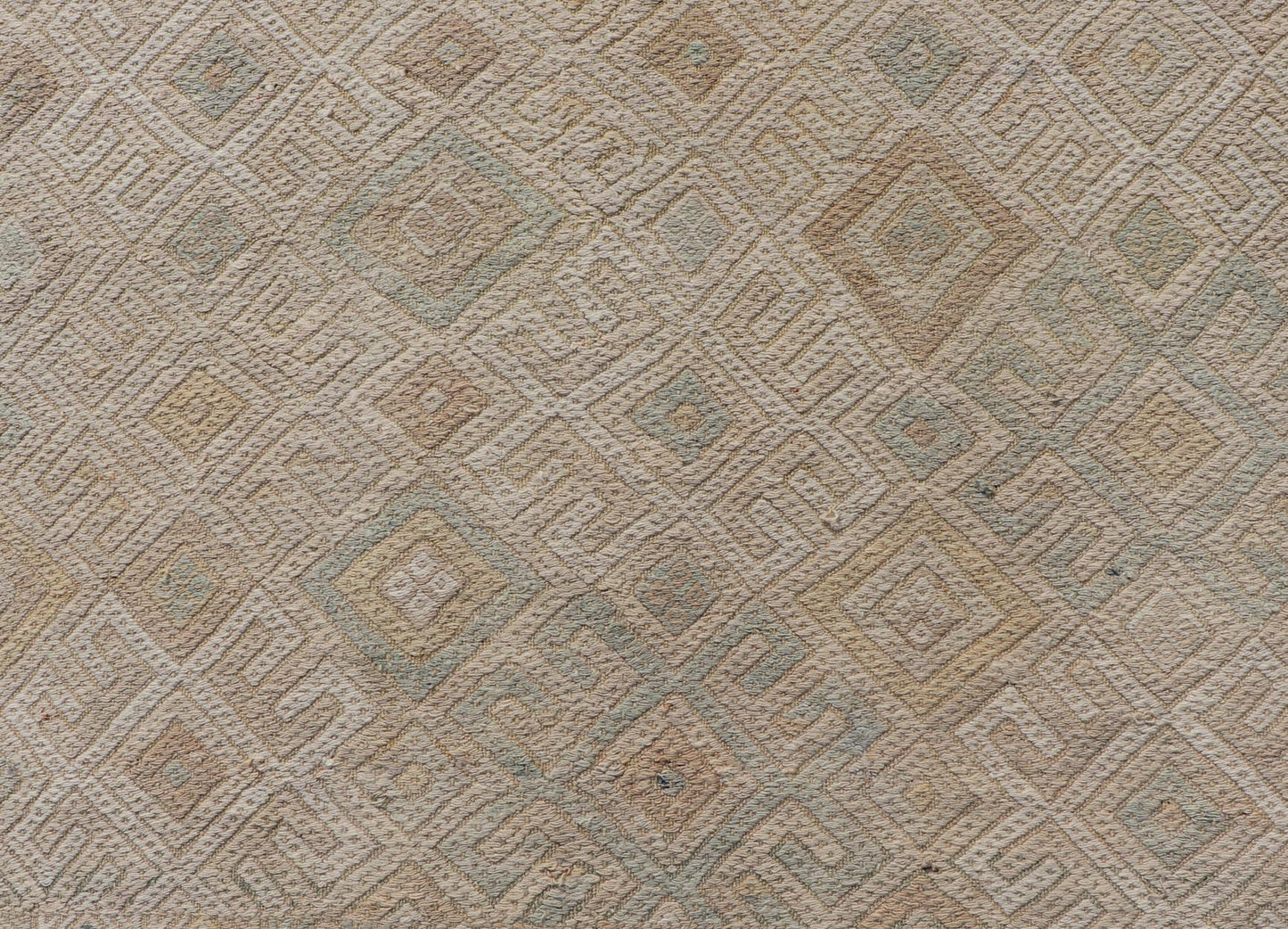 Vintage Turkish Embroidered Rug with All - Over Geometric Diamond Design Measures: 5'0 x 6'5 This vintage Turkish Kilim features soft neutral colors and a woven texture. The design is a sub - geometric tribal diamond design in faded light gr... - Keivan Woven ArtsEN - 13483 - 18818Rug