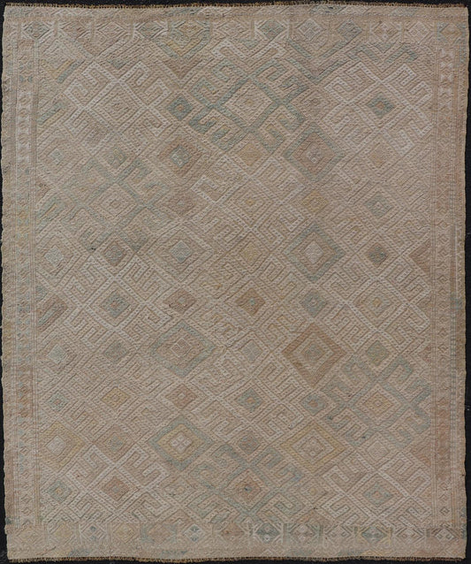 Vintage Turkish Embroidered Rug with All - Over Geometric Diamond Design Measures: 5'0 x 6'5 This vintage Turkish Kilim features soft neutral colors and a woven texture. The design is a sub - geometric tribal diamond design in faded light gr... - Keivan Woven ArtsEN - 13483 - 18818