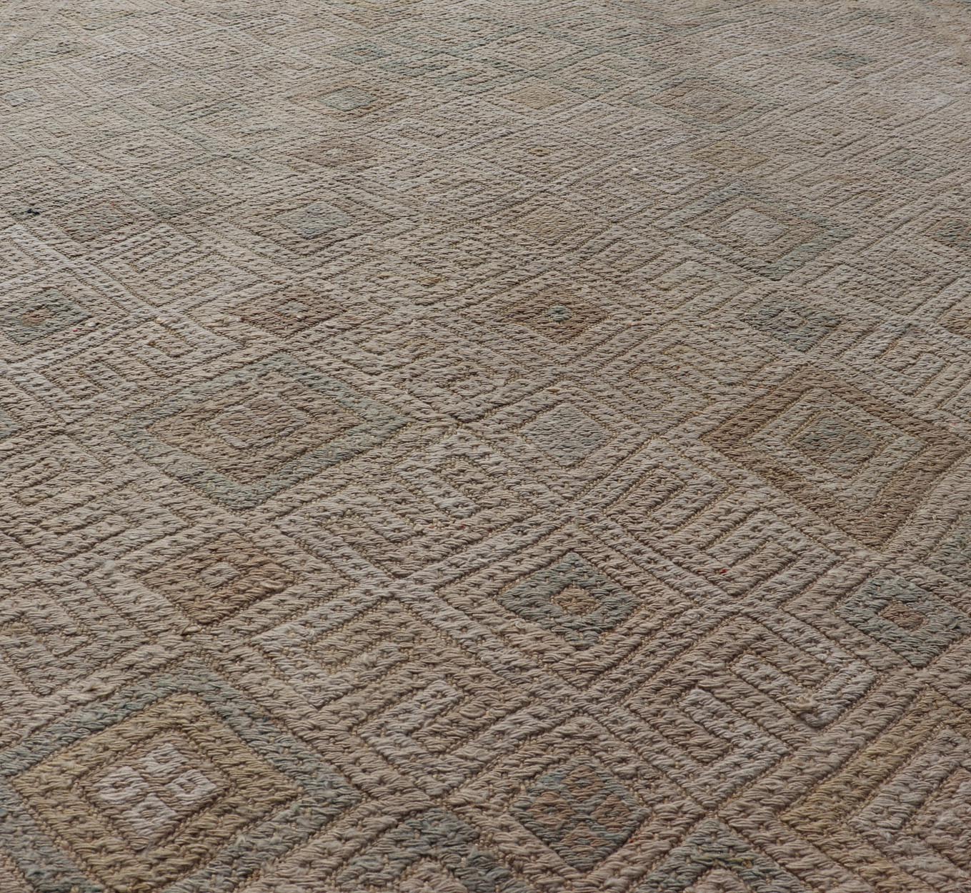 Vintage Turkish Embroidered Rug with All - Over Geometric Diamond Design Measures: 5'0 x 6'5 This vintage Turkish Kilim features soft neutral colors and a woven texture. The design is a sub - geometric tribal diamond design in faded light gr... - Keivan Woven ArtsEN - 13483 - 18818Rug