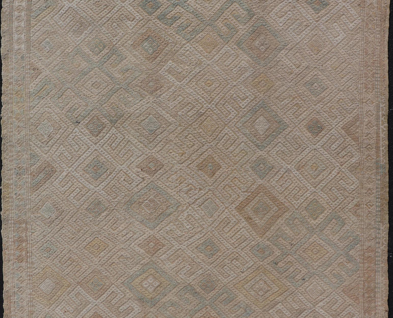 Vintage Turkish Embroidered Rug with All - Over Geometric Diamond Design Measures: 5'0 x 6'5 This vintage Turkish Kilim features soft neutral colors and a woven texture. The design is a sub - geometric tribal diamond design in faded light gr... - Keivan Woven ArtsEN - 13483 - 18818Rug
