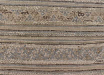 Measures: 5'3 x 9'0 Turkish Vintage Kilim With Embroidered Motifs in Earthy Tones with Blue - Gray. Keivan Woven Arts / rug EN - 13495, country of origin / type: Turkey / Kilim, circa 1950 This flat - woven Kilim from Turkey features an enticing c... - Keivan Woven ArtsEN - 13495 - 21727Rug