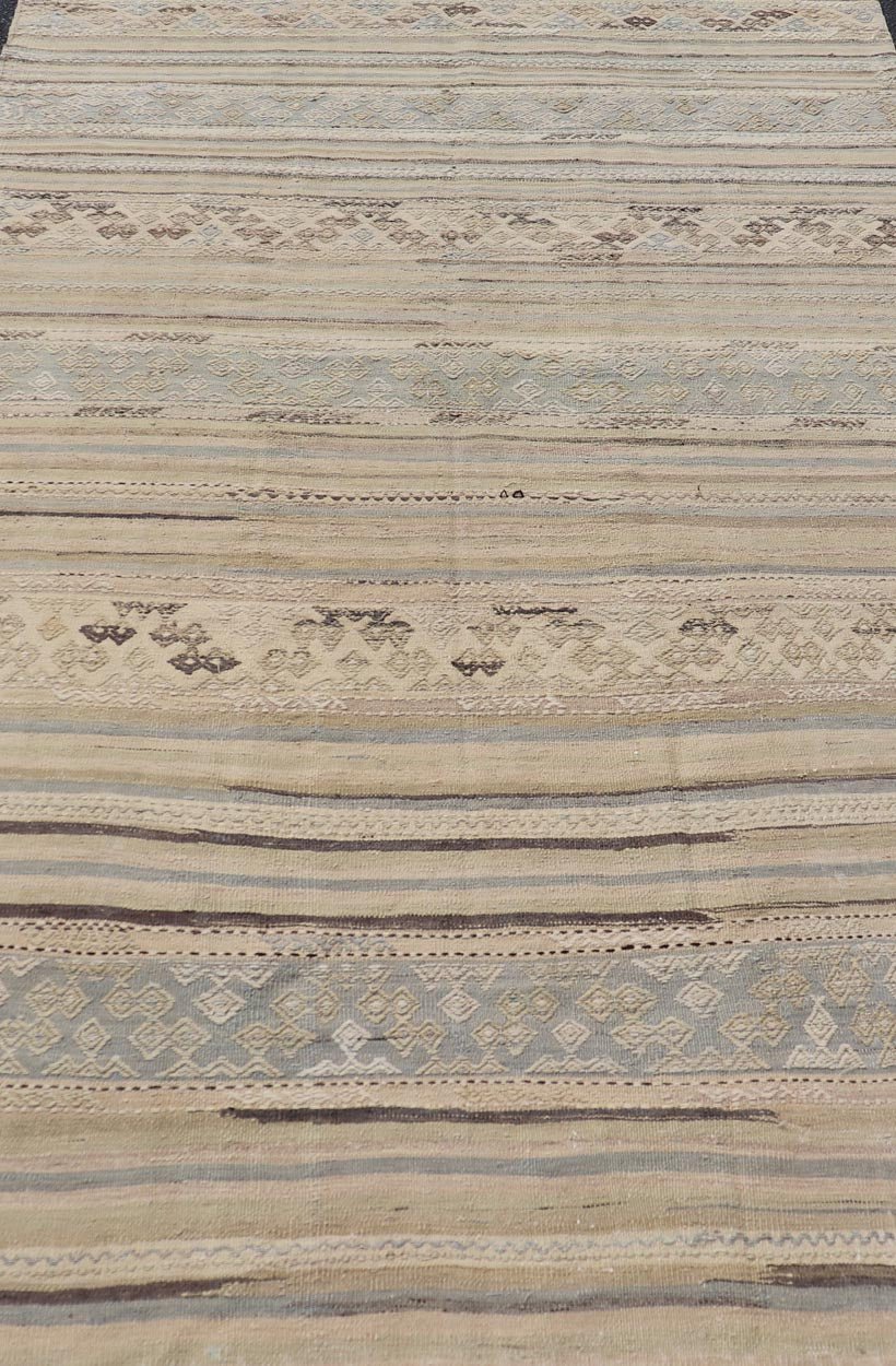 Measures: 5'3 x 9'0 Turkish Vintage Kilim With Embroidered Motifs in Earthy Tones with Blue - Gray. Keivan Woven Arts / rug EN - 13495, country of origin / type: Turkey / Kilim, circa 1950 This flat - woven Kilim from Turkey features an enticing c... - Keivan Woven ArtsEN - 13495 - 21727Rug