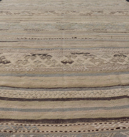 Measures: 5'3 x 9'0 Turkish Vintage Kilim With Embroidered Motifs in Earthy Tones with Blue - Gray. Keivan Woven Arts / rug EN - 13495, country of origin / type: Turkey / Kilim, circa 1950 This flat - woven Kilim from Turkey features an enticing c... - Keivan Woven ArtsEN - 13495 - 21727Rug