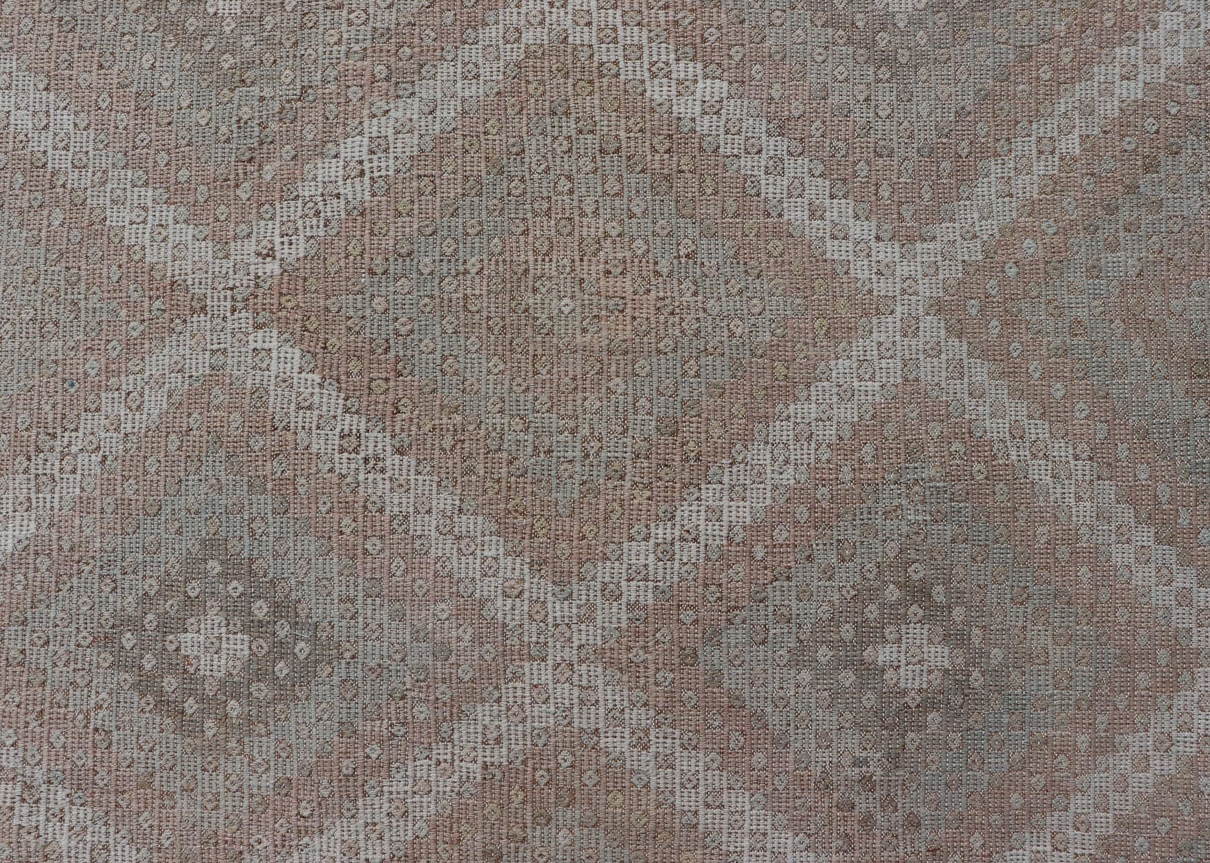 Vintage Turkish Embroidered Rug with Geometric Diamond Design with Soft Colors Embroidered vintage rug from Turkey in shades of tan, light green, light red, and cream with geometric pattern, Keivan Woven Arts / rug EN - 13652, country of origin / ... - Keivan Woven ArtsEN - 13652 - 18830Rug
