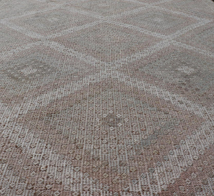 Vintage Turkish Embroidered Rug with Geometric Diamond Design with Soft Colors Embroidered vintage rug from Turkey in shades of tan, light green, light red, and cream with geometric pattern, Keivan Woven Arts / rug EN - 13652, country of origin / ... - Keivan Woven ArtsEN - 13652 - 18830Rug