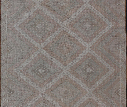 Vintage Turkish Embroidered Rug with Geometric Diamond Design with Soft Colors Embroidered vintage rug from Turkey in shades of tan, light green, light red, and cream with geometric pattern, Keivan Woven Arts / rug EN - 13652, country of origin / ... - Keivan Woven ArtsEN - 13652 - 18830Rug