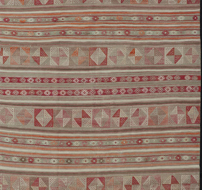 Measures: 4'10 x 6'6 Colorful Turkish Vintage Embroidered Kilim with Stripes and Geometric Motifs. Keivan Woven Arts / rug EN - 13798, country of origin / type: Turkey / Kilim, circa 1950 This vintage Kilim displays an array of designs, includ... - Keivan Woven ArtsEN - 13798 - 18413Rug