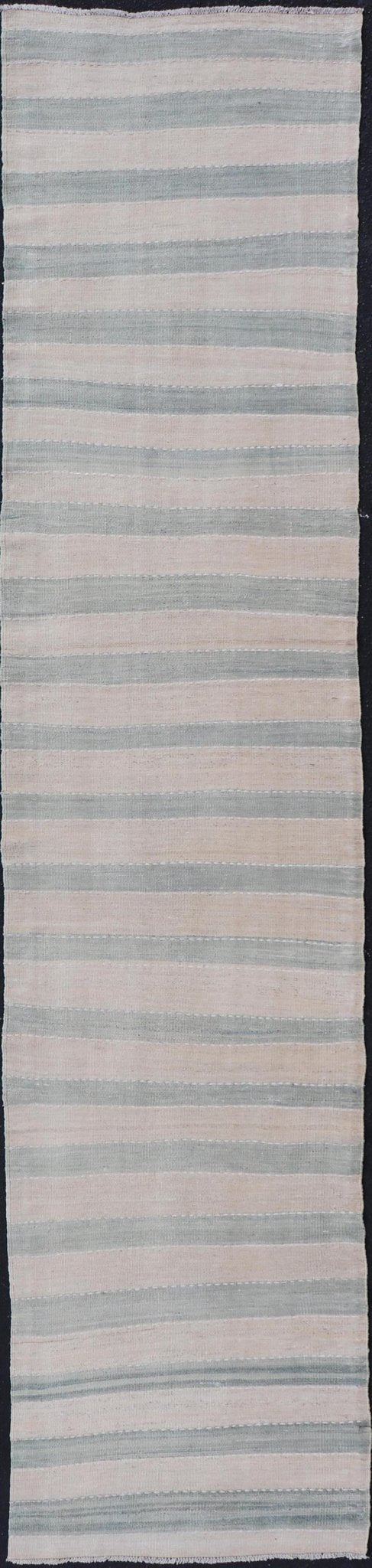 Vintage Turkish Kilim Runner with Horizontal Stripes of Light Green Measures: 2'7 x 12'2 This vintage Turkish Kilim runner features light, faded colors in a simple striped pattern. Each of the charcoal and salmon panels are divided by ... - Keivan Woven ArtsEN - 13917 - 18842