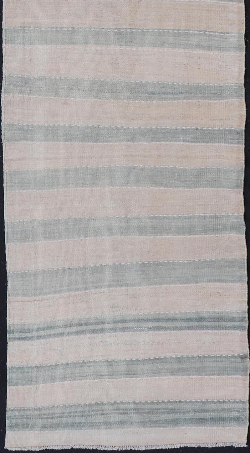 Vintage Turkish Kilim Runner with Horizontal Stripes of Light Green Measures: 2'7 x 12'2 This vintage Turkish Kilim runner features light, faded colors in a simple striped pattern. Each of the charcoal and salmon panels are divided by ... - Keivan Woven ArtsEN - 13917 - 18842Rug