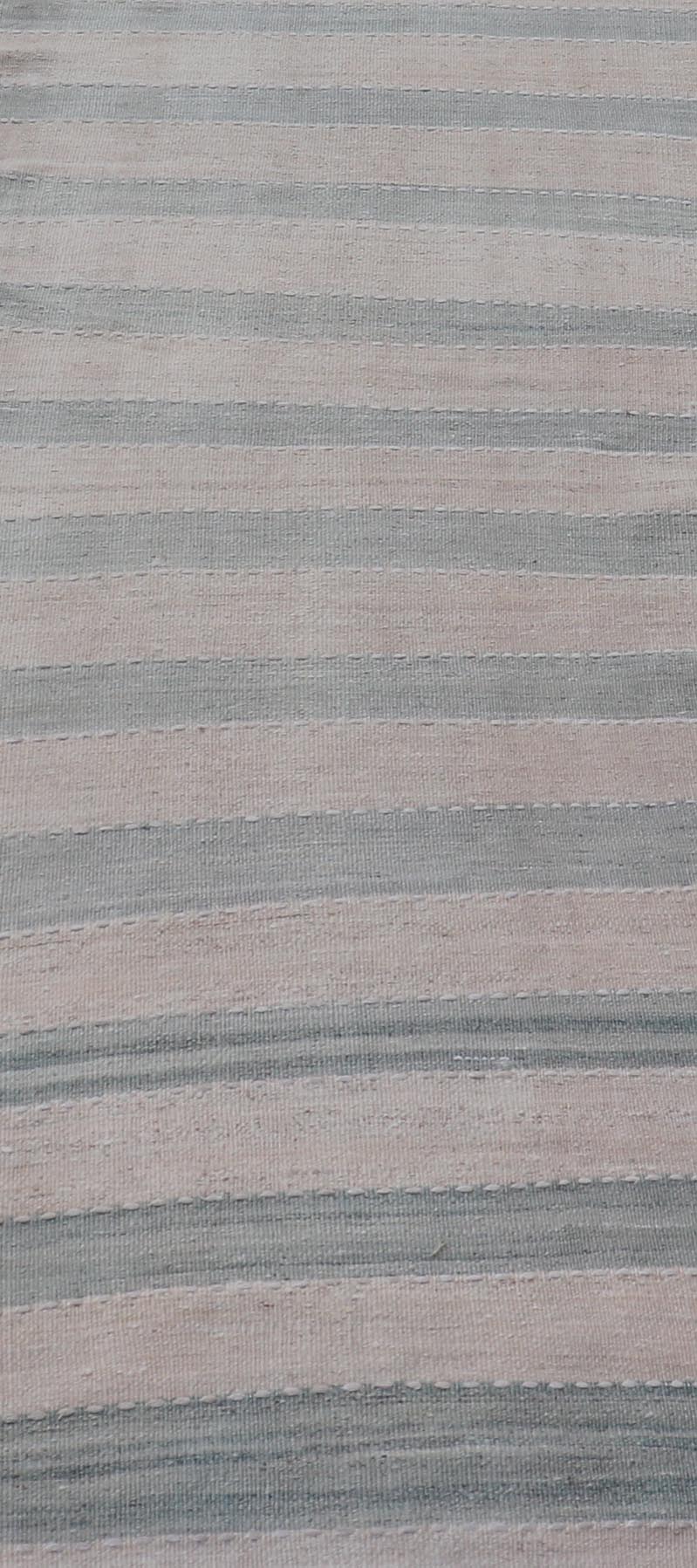 Vintage Turkish Kilim Runner with Horizontal Stripes of Light Green Measures: 2'7 x 12'2 This vintage Turkish Kilim runner features light, faded colors in a simple striped pattern. Each of the charcoal and salmon panels are divided by ... - Keivan Woven ArtsEN - 13917 - 18842Rug