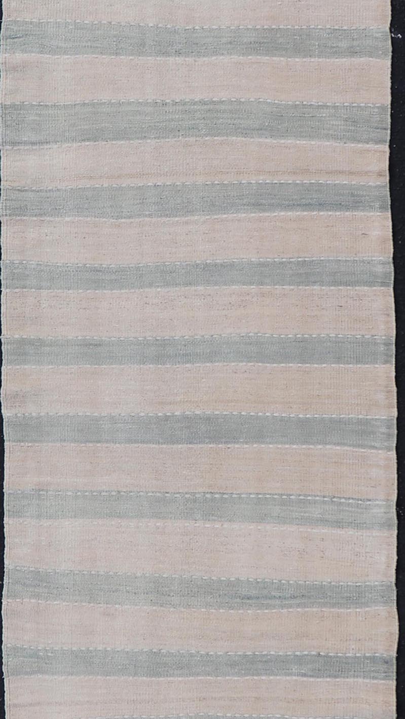Vintage Turkish Kilim Runner with Horizontal Stripes of Light Green Measures: 2'7 x 12'2 This vintage Turkish Kilim runner features light, faded colors in a simple striped pattern. Each of the charcoal and salmon panels are divided by ... - Keivan Woven ArtsEN - 13917 - 18842Rug