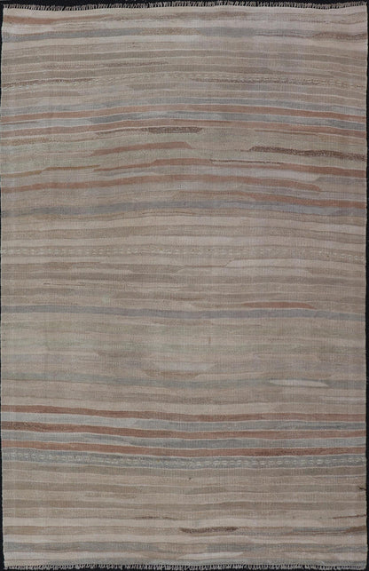Minimalist Striped Design Vintage Turkish Kilim with Neutral Tones Measures 3'9 x 6'0 This wonderful piece features easy colors and a simple design. The palette consists of muted reds and blues, accenting the camel, fawn, and cocoa mass. ... - Keivan Woven ArtsEN - 13942 - 18926Rug
