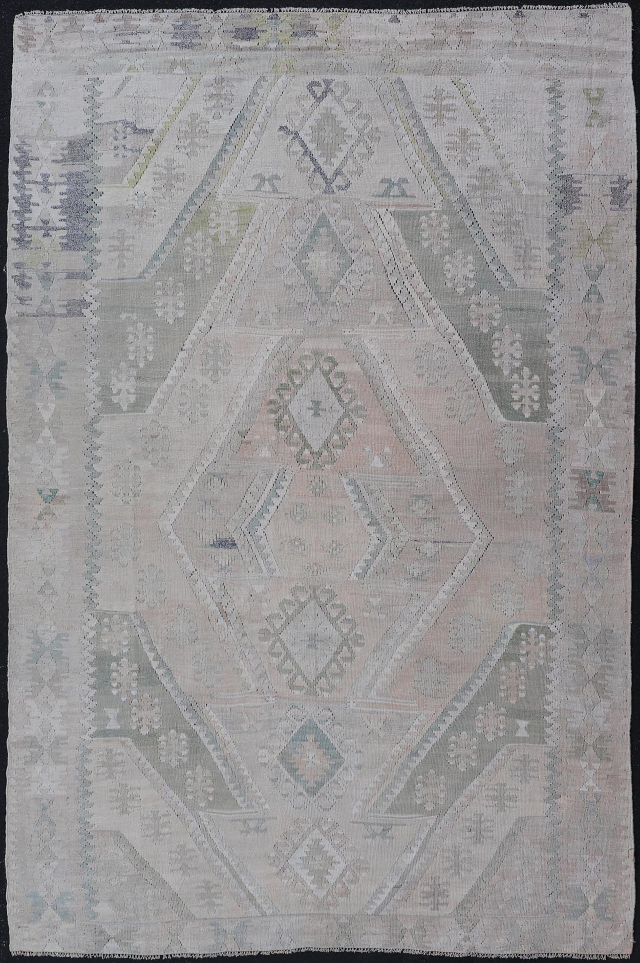 Vintage Hand - Woven Turkish Kilim in Wool with Medallion Sub - Geometric Design This flat - weave tribal Turkish kilim has been hand - woven in wool. The rug features an all - over sub - geometric medallion design, rendered in greens, blues and neutra... - Keivan Woven ArtsEN - 13963 - 19496