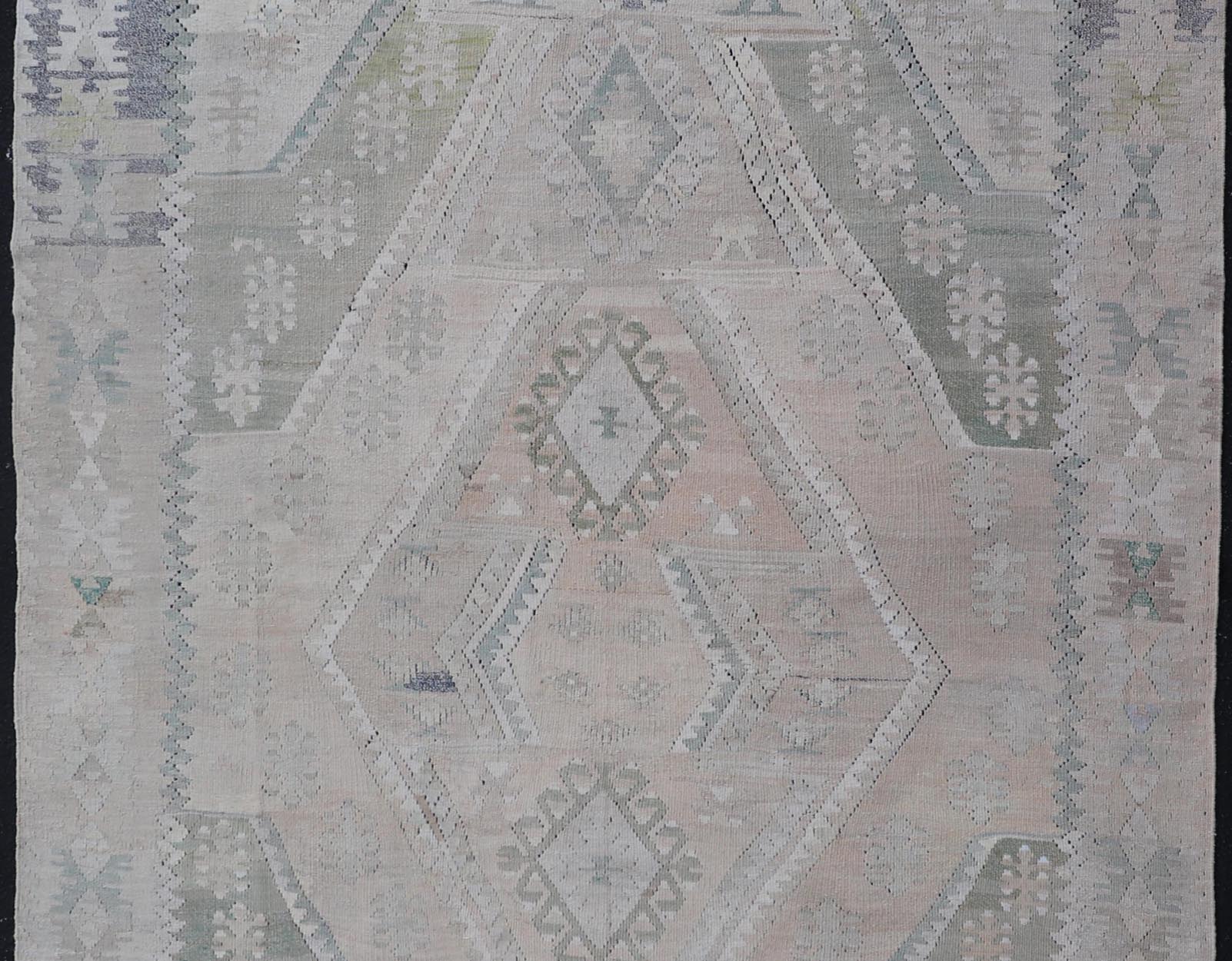 Vintage Hand - Woven Turkish Kilim in Wool with Medallion Sub - Geometric Design This flat - weave tribal Turkish kilim has been hand - woven in wool. The rug features an all - over sub - geometric medallion design, rendered in greens, blues and neutra... - Keivan Woven ArtsEN - 13963 - 19496