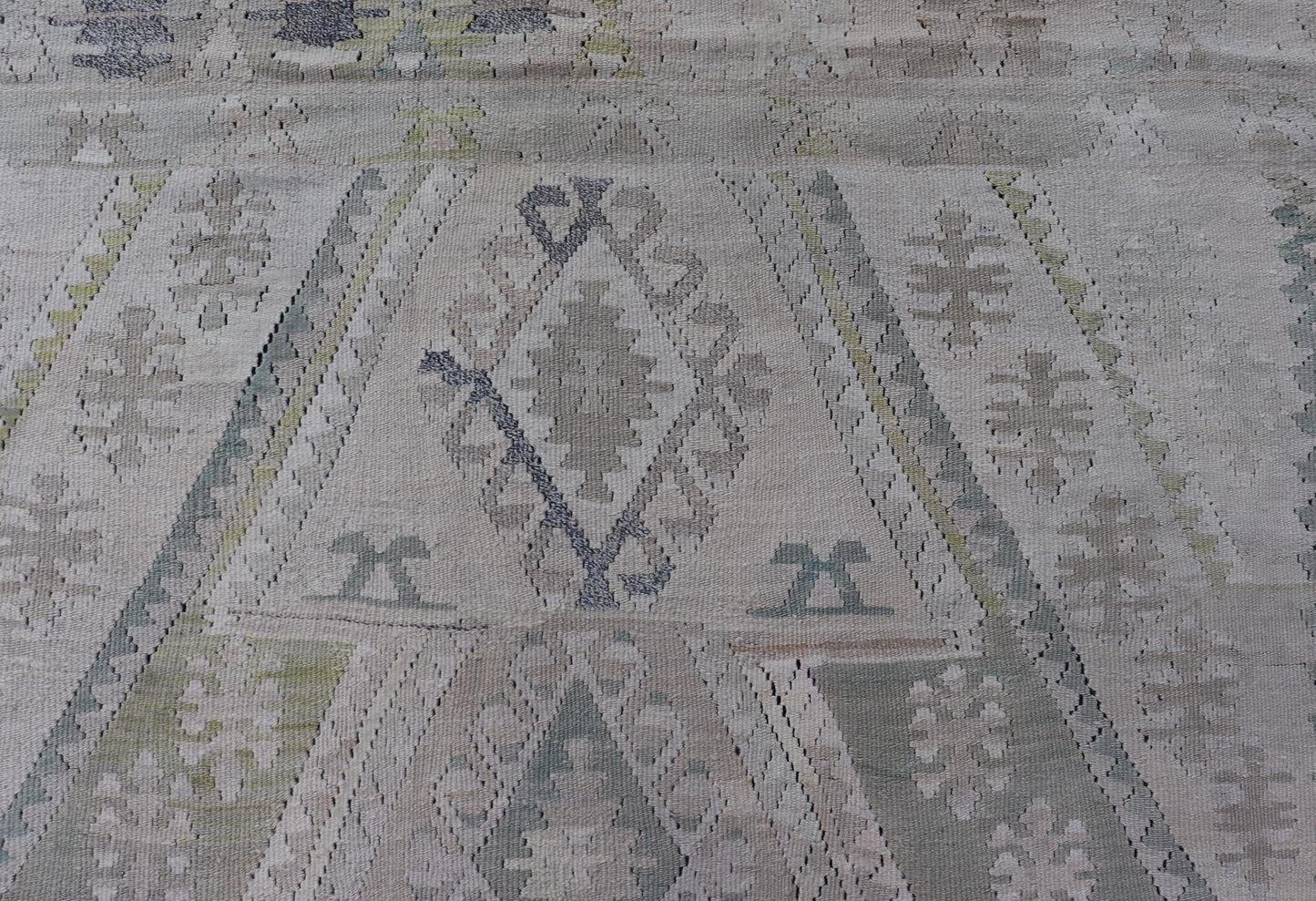 Vintage Hand - Woven Turkish Kilim in Wool with Medallion Sub - Geometric Design This flat - weave tribal Turkish kilim has been hand - woven in wool. The rug features an all - over sub - geometric medallion design, rendered in greens, blues and neutra... - Keivan Woven ArtsEN - 13963 - 19496
