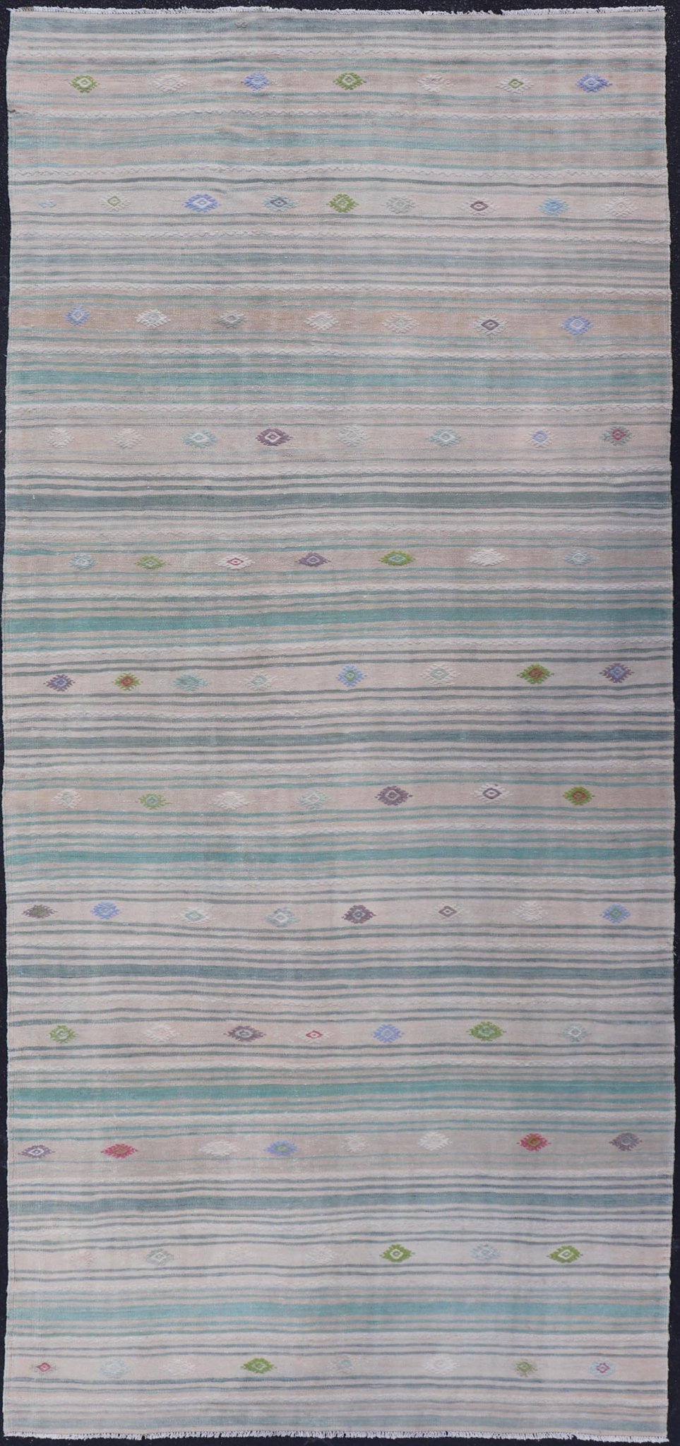 Vintage Hand - Woven Turkish Kilim Gallery Rug in Wool with All - Over Stripe Design This flat - weave tribal Turkish kilim has been hand - woven in wool. The rug features an all - over sub - geometric striped design, and is rendered in multicolor; making ... - Keivan Woven ArtsEN - 13980 - 19502Rug