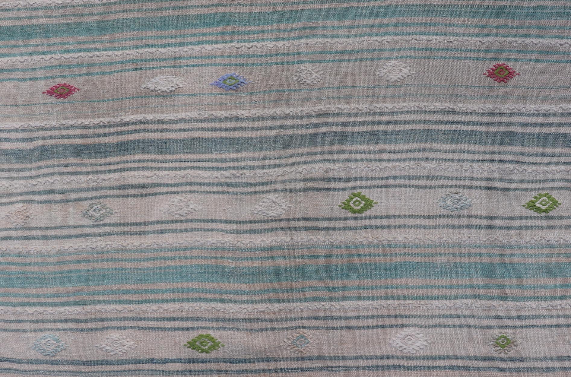Vintage Hand - Woven Turkish Kilim Gallery Rug in Wool with All - Over Stripe Design This flat - weave tribal Turkish kilim has been hand - woven in wool. The rug features an all - over sub - geometric striped design, and is rendered in multicolor; making ... - Keivan Woven ArtsEN - 13980 - 19502Rug