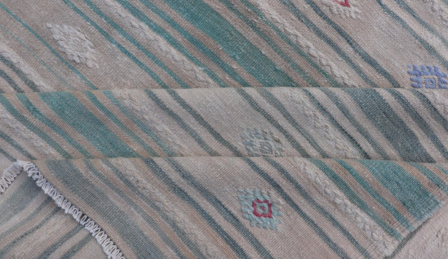 Vintage Hand - Woven Turkish Kilim Gallery Rug in Wool with All - Over Stripe Design This flat - weave tribal Turkish kilim has been hand - woven in wool. The rug features an all - over sub - geometric striped design, and is rendered in multicolor; making ... - Keivan Woven ArtsEN - 13980 - 19502Rug