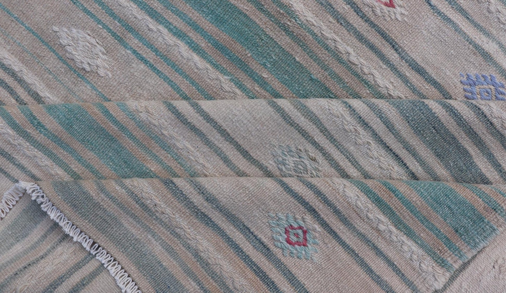 Vintage Hand - Woven Turkish Kilim Gallery Rug in Wool with All - Over Stripe Design This flat - weave tribal Turkish kilim has been hand - woven in wool. The rug features an all - over sub - geometric striped design, and is rendered in multicolor; making ... - Keivan Woven ArtsEN - 13980 - 19502Rug