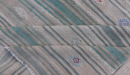 Vintage Hand - Woven Turkish Kilim Gallery Rug in Wool with All - Over Stripe Design This flat - weave tribal Turkish kilim has been hand - woven in wool. The rug features an all - over sub - geometric striped design, and is rendered in multicolor; making ... - Keivan Woven ArtsEN - 13980 - 19502Rug