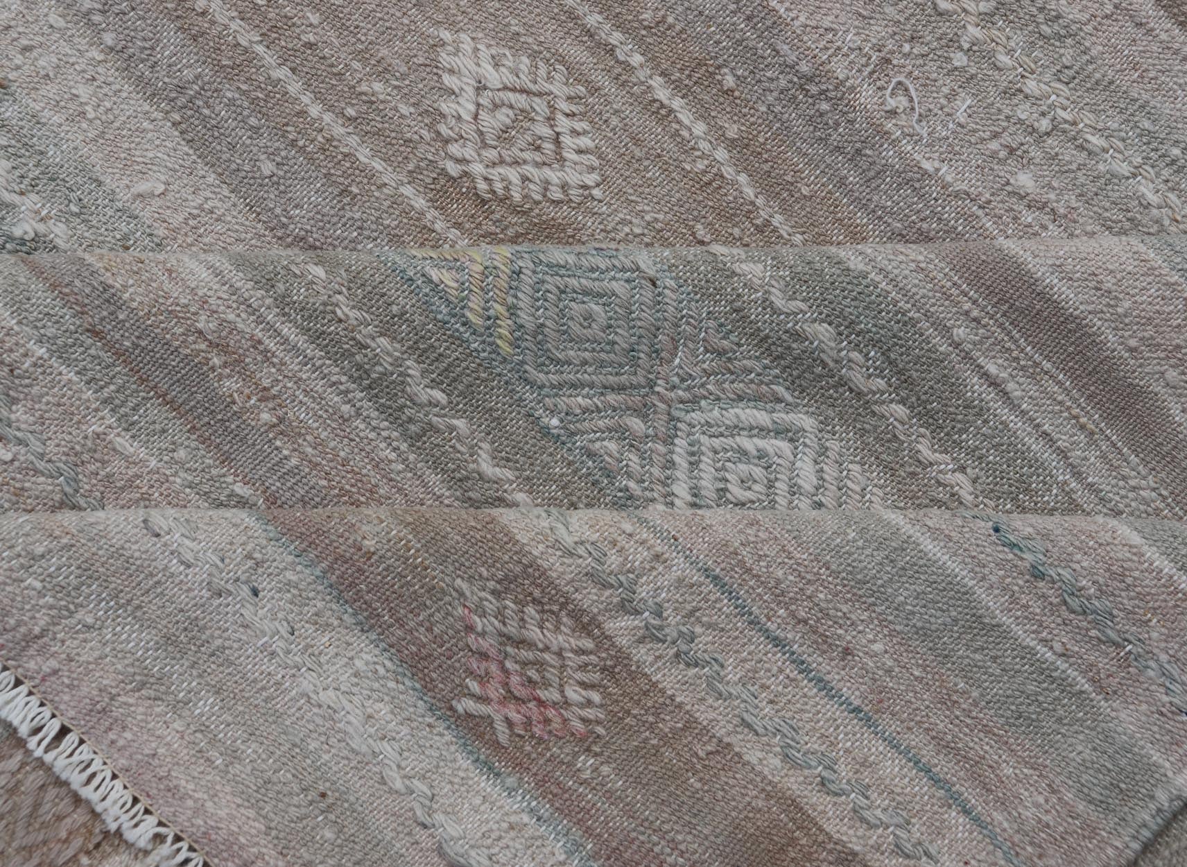 Turkish Flat - Weave Kilim with Embroideries in Taupe, Tan, Light Green, and Gray Vintage flat - weave Kilim with embroideries in tan, light green, and gray with a modern design geometric stripe design Vintage Kilim from Turkey, Keivan Woven Arts... - Keivan Woven ArtsEN - 13981 - 18872