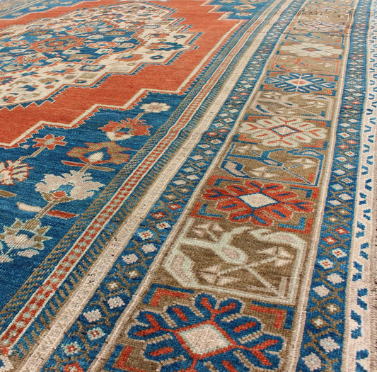 Vintage Turkish Oushak Rug Renowned for their distinctive composition and use of warm hues, Oushak rugs are among the most captivating Turkish carpets. This Oushak rug features a centre medallion and a large - scale design that showcases floral mo... - Keivan Woven ArtsEN - 140029 - 5546