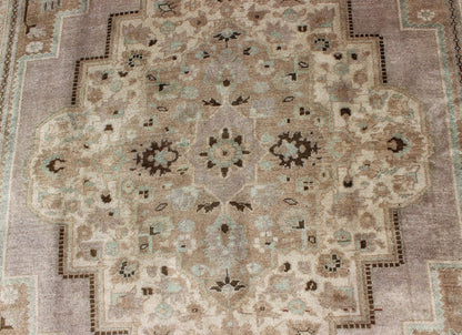 Vintage Turkish Floral Medallion Oushak in Earth Tones, Lavender, and Ice Blue Measures: 7'2 x 11'0 This stunning vintage Turkish Oushak carpet (circa mid - 20th century) features a central medallion with floral motifs and subtle sub - geome... - Keivan Woven ArtsEN - 140042 - 5550Rug