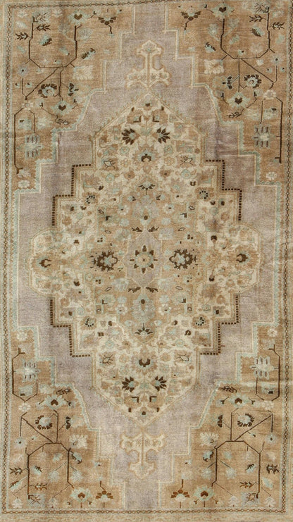 Vintage Turkish Floral Medallion Oushak in Earth Tones, Lavender, and Ice Blue Measures: 7'2 x 11'0 This stunning vintage Turkish Oushak carpet (circa mid - 20th century) features a central medallion with floral motifs and subtle sub - geome... - Keivan Woven ArtsEN - 140042 - 5550Rug
