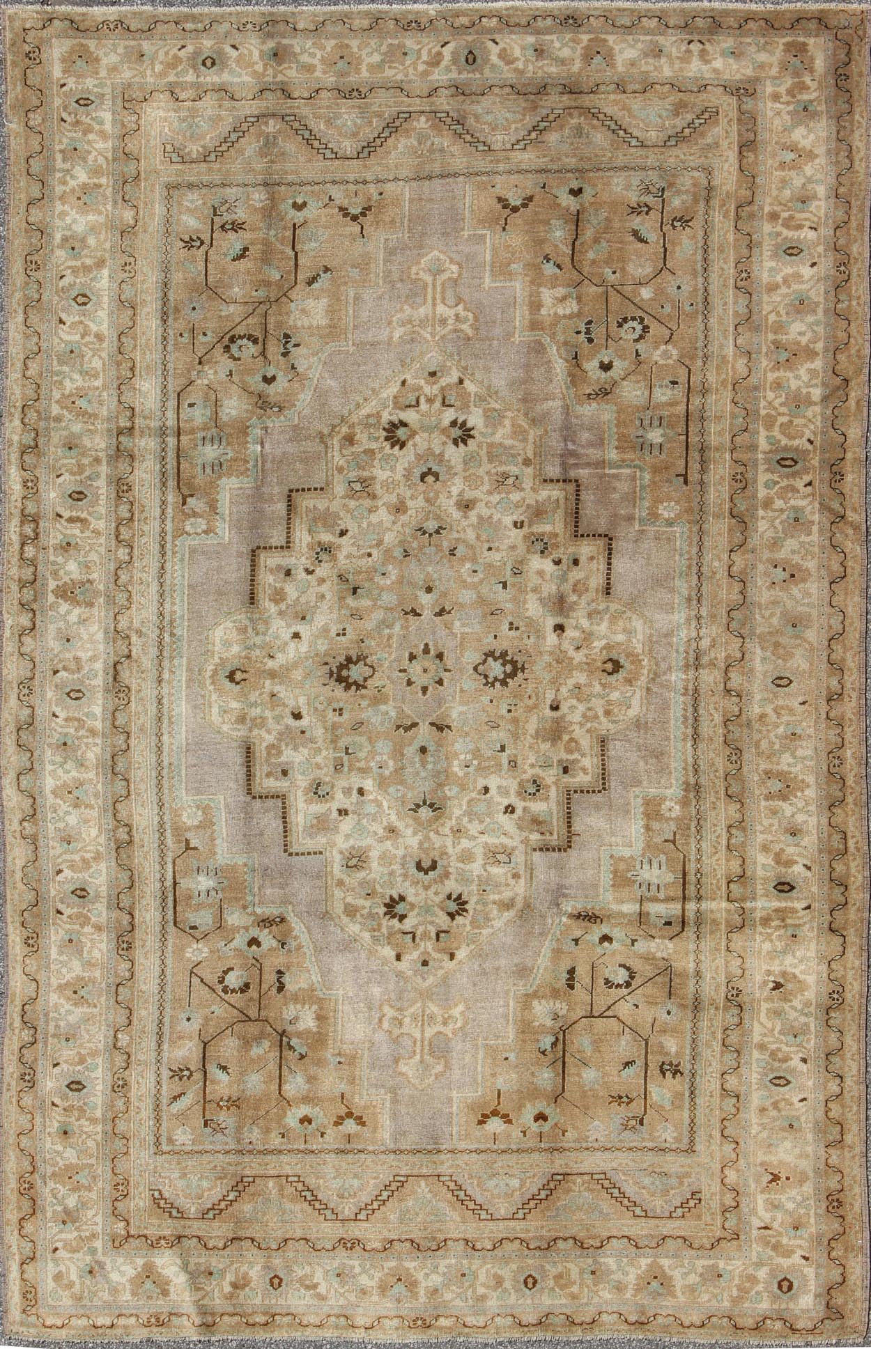 Vintage Turkish Floral Medallion Oushak in Earth Tones, Lavender, and Ice Blue Measures: 7'2 x 11'0 This stunning vintage Turkish Oushak carpet (circa mid - 20th century) features a central medallion with floral motifs and subtle sub - geome... - Keivan Woven ArtsEN - 140042 - 5550Rug