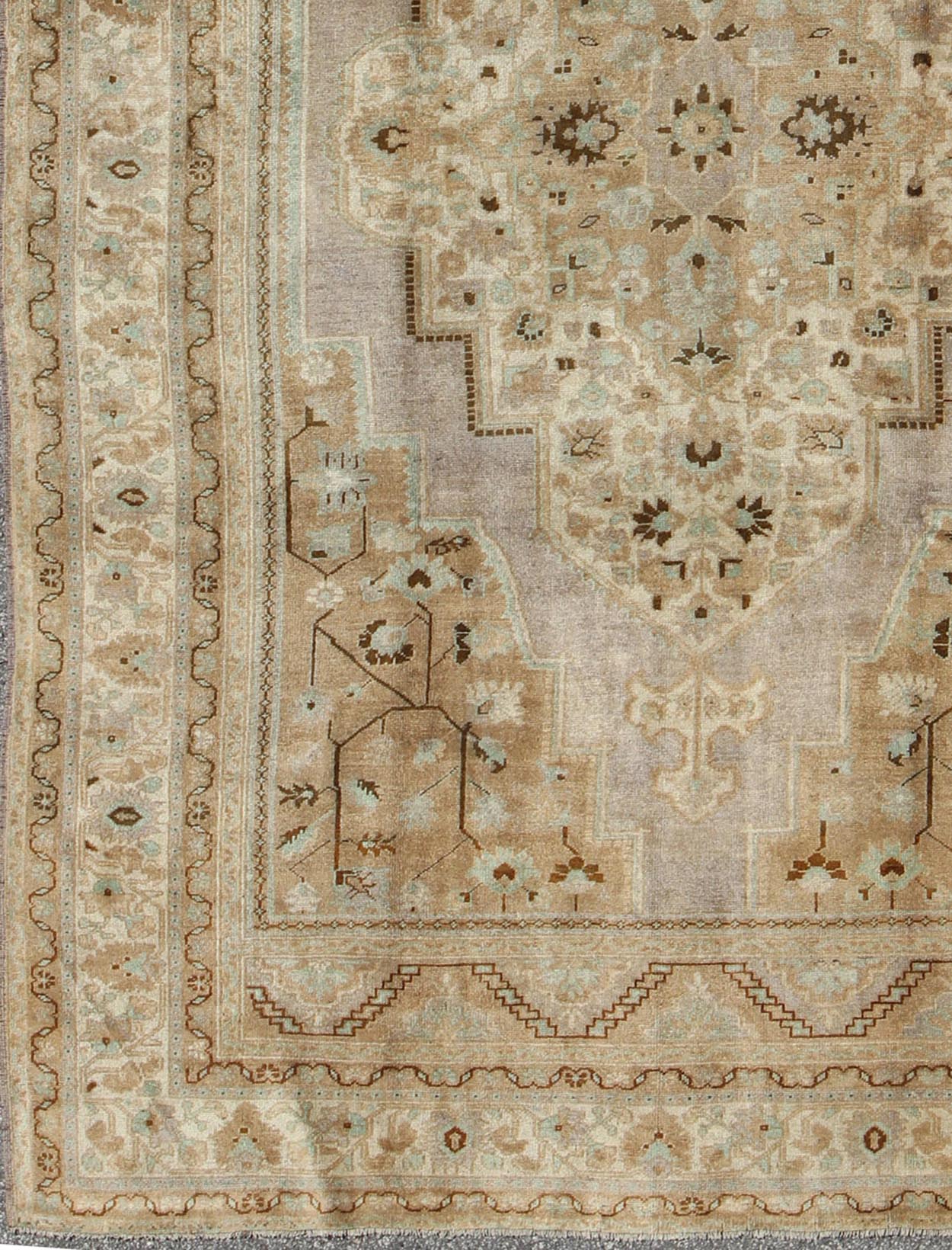 Vintage Turkish Floral Medallion Oushak in Earth Tones, Lavender, and Ice Blue Measures: 7'2 x 11'0 This stunning vintage Turkish Oushak carpet (circa mid - 20th century) features a central medallion with floral motifs and subtle sub - geome... - Keivan Woven ArtsEN - 140042 - 5550Rug