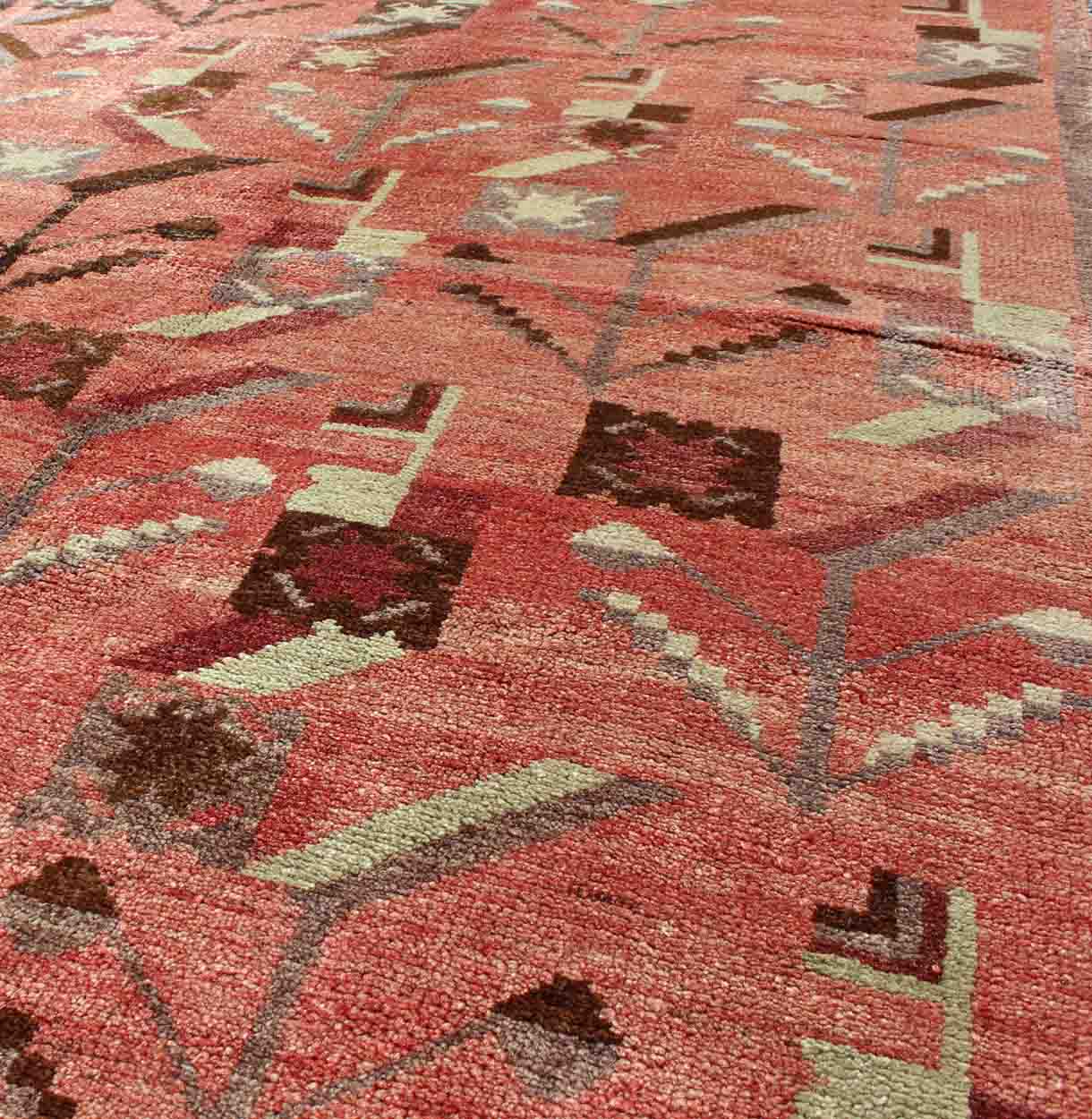 Turkish Oushak Vintage Carpet with Tribal Figures Set soft Red Pink Background Oushak Vintage Carpet with Tribal Figures Set on a Faint Red/Pink Background Keivan Woven Arts/ rug#EN - 140087 origin/Turkey, Hand knotted vintage rug. Measure... - Keivan Woven ArtsEN - 140087 - 5572Rug