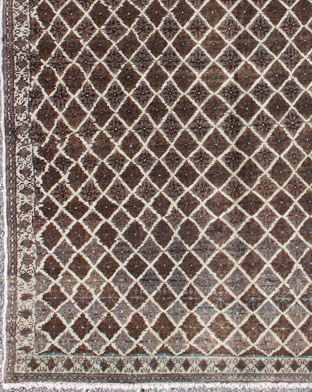 Turkish Rug with Unique Design This vintage Mid - Century Turkish rug features a contemporary design on a predominantly chocolate - brown background with ivory outlines and hints of light icy blue. Measures: 3'9 x 5'4. - Keivan Woven ArtsEN - 140196 - 5582Rug