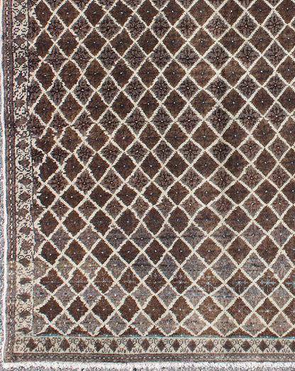 Turkish Rug with Unique Design This vintage Mid - Century Turkish rug features a contemporary design on a predominantly chocolate - brown background with ivory outlines and hints of light icy blue. Measures: 3'9 x 5'4. - Keivan Woven ArtsEN - 140196 - 5582Rug