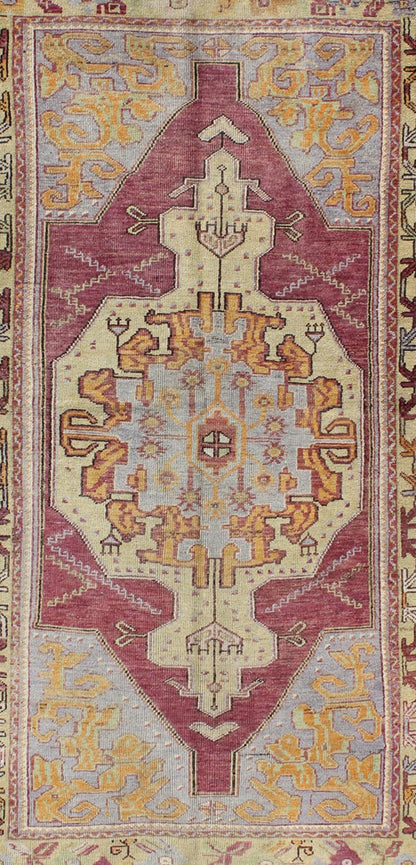 Purple and blue vintage Turkish Oushak rug with layered geometric medallion, rug en - 140282, country of origin / type: Turkey / Oushak, circa 1940 This vintage Turkish Oushak rug features an intricately beautiful design with a tribal aesthetic. T... - Keivan Woven ArtsEN - 140282 - 5626Rug