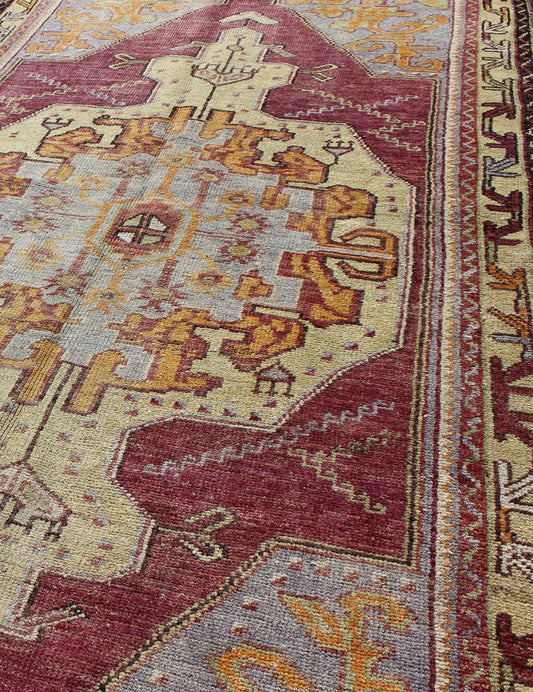 Purple and blue vintage Turkish Oushak rug with layered geometric medallion, rug en - 140282, country of origin / type: Turkey / Oushak, circa 1940 This vintage Turkish Oushak rug features an intricately beautiful design with a tribal aesthetic. T... - Keivan Woven ArtsEN - 140282 - 5626Rug