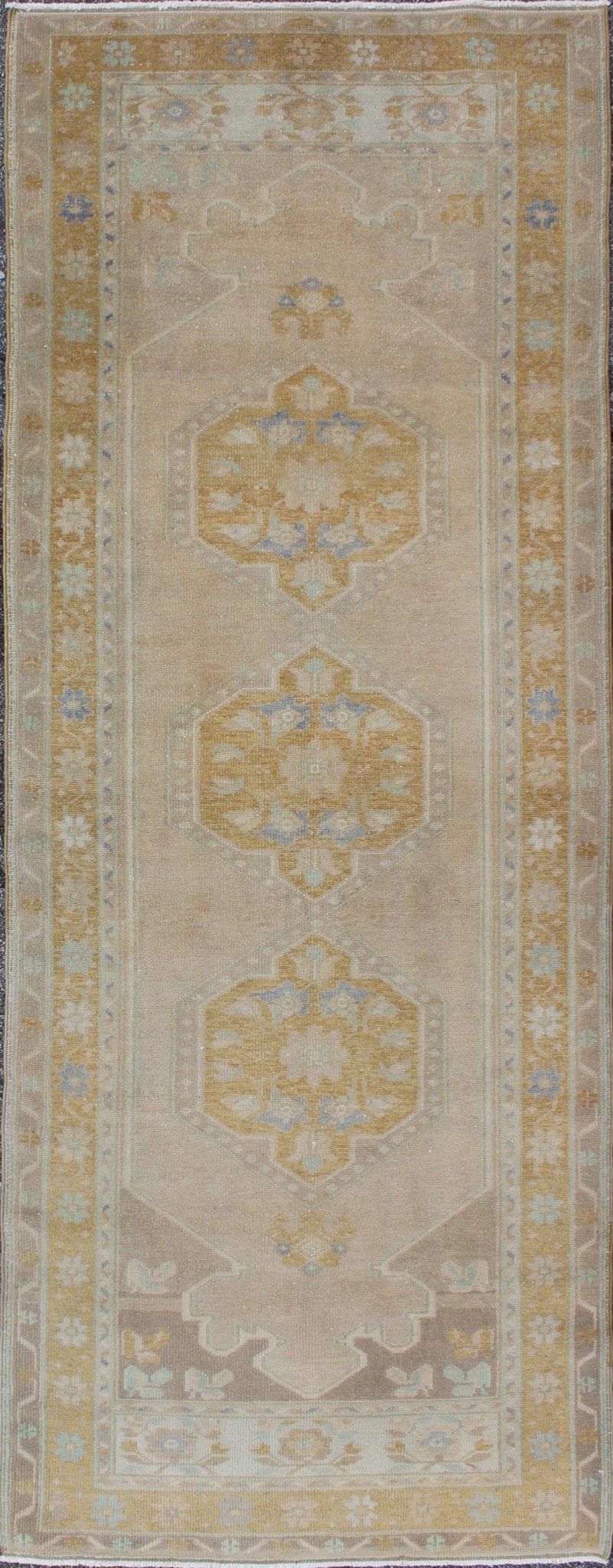 Acid green and gray vintage Turkish Oushak runner with floral medallions, rug en - 140350, country of origin / type: Turkey / Oushak, circa 1940. This vintage Oushak runner features a unique blend of cheerful colors and an intricately beautiful de... - Keivan Woven ArtsEN - 140350 - 5634Rug